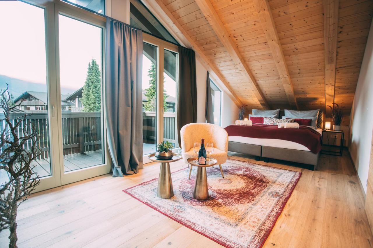 Boutique Chalets Alpi - Private Sauna & Cinema การ์มิช-พาร์เทนเคียร์เชน ภายนอก รูปภาพ